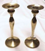 A pair of American Sterling Candlesticks, of typical form with tapering stems and spreading circular
