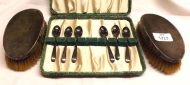 A Mixed Lot comprising: two Silver Backed Dressing Table Brushes and six Walker & Hall Silver Plated