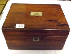 A Victorian Rosewood Vanity Box, the lid with mother-of-pearl nameplate, similar escutcheon below,