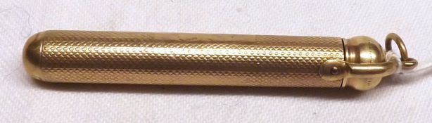 A Gold Plated Travelling Propelling Pencil, the case with engine-turned detail, marked W S Hicks,