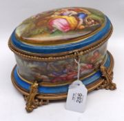 A 19th Century French Porcelain Scent Bottle Box, of oval form, the interior fitted with four