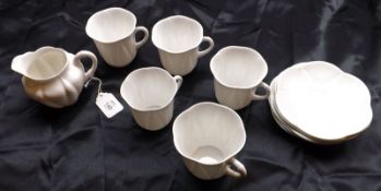 Five White Shelley Cups and Saucers and accompanying Cream Jug, Reg No 272101