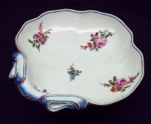 A Sevres Scallop-shaped Dish, decorated with coloured floral sprays on a white background, 8 ¾”