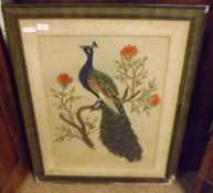 An unusual early 20th Century Feather Picture of a peacock amongst foliage, 27” wide including frame