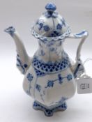 A Royal Copenhagen small Coffee Pot, decorated with a blue floral pattern on a cream background