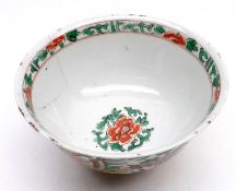 An Oriental Circular Bowl of tapering form, decorated in famille verte and iron red with foliage (