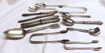 A collection of Flatwares, including three pairs of Sugar Tongs (two Old English pattern, one Fiddle