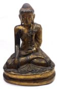 A Gilded Lacquered Burmese Buddha Statue modelled as a seated sakyamuni in bhurmisparsa mudra (