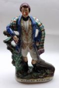 A 19th Century Staffordshire Figure of Robert Burns decorated throughout in colours and raised on