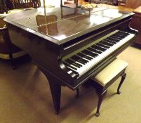 A Challen Mahogany Cased Boudoir Grand Piano, raised on tapering square supports with brass caps and