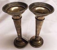 A pair of George V Tapering Vases with pierced rims, on round spreading loaded bases, Sheffield