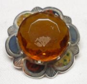 A Scottish hallmarked Silver Shaped Circular Brooch with centre facetted orange stone and with Agate