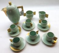 A Carlton Ware Coffee Service, decorated with gilt handles and highlights on a turquoise ground,