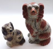 A Mixed Lot: Staffordshire liver and white spaniel; and a further smaller example, largest piece