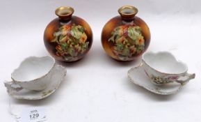 A Mixed Lot comprising: a pair of early 20th Century Small Narrow-Necked Vases, decorated with an