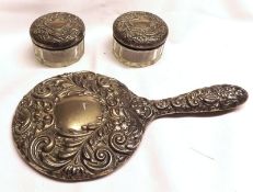 A Mixed Lot comprising: a Silver Backed Dressing Table Hand Mirror with embossed floral and green