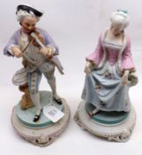 A pair of late 19th Century Painted Parian Figures of a violinist and his lady, approx 10 ½” tall (