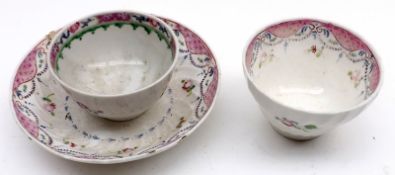 An Oriental Triple of Two Tea Bowls and a Saucer (matched)