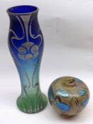 A Mixed Lot comprising: an early 20th Century Blue and Green Iridescent Studio Glass Vase, decorated