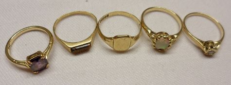 A group of four hallmarked 9ct Gold Stone Set Rings and a further hallmarked 9ct Gold Signet Ring (