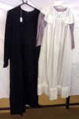 A Chequered Prairie Style Dress with full whitework apron; together with a Black Cotton Twill School