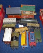 A collection of Hornby 0-Gauge Rolling Stock etc, including Guards Van; Cement Van; three Flat Bed