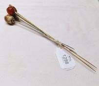 A group of five assorted Metal Hatpins with decorative enamelled, ceramic etc finials (5)