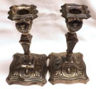 A pair of late Victorian Dressing Table Candlesticks, fitted with removable nozzles, stems with