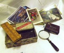 A Box: Postcards, Cigarette Lighters, Magnifying Glass and other mixed items