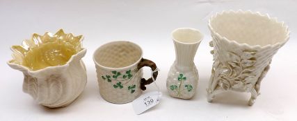 A Mixed Lot of Belleek Irish Porcelain comprising: a small Jardinière raised on three twin-shaped