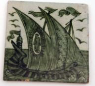 A William de Morgan Tile, decorated in green with a Viking ship, one sail decorated with a figure,