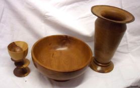 A large Turned Yew Wood Fruit Bowl, 8 ½” diameter; together with a large Turned Wooden Tapering Vase