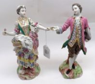 A pair of 19th Century Continental Figures (probably of Sitzendorf manufacture) of a young dandy and