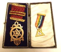 A yellow metal Masonic Chapter Jewel with three yellow metal ribbon bars, marked “9ct” + small