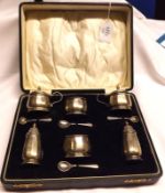 A cased George V Condiment Set, comprising two Lidded Mustards, two Circular Salts, a Pepper and