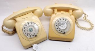 A collection of five 1970s Ivory Coloured Plastic Telephones, all 5 ½” wide