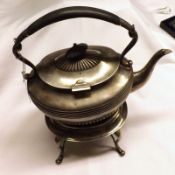 A late Victorian Spirit Kettle of typical form, the kettle with hardwood handle, hinged lid and