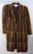 A Vintage ¾ Length Musquash Fur Coat