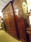 A large Victorian Flame Mahogany Combination Wardrobe and Linen Press, two full length side doors,
