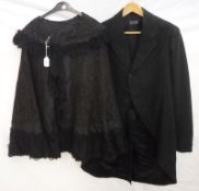 A Victorian Black Silk Mourning Cape, overlaid with net lace embellished with applique work;