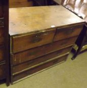 A 19th Century Campaign Chest of two short and three long drawers, with brass handles and