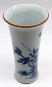 A Chinese Trumpet Vase, decorated in underglaze blue with birds perched amidst branches within an