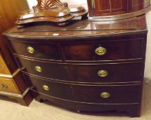 A 19th Century Mahogany Bow Front Four Drawer Chest with brass ringlet handles, raised on stile