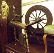 A Vintage Oak and Elm Spinning Wheel, (some woodworm throughout), 36” long