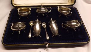 An early 20th Century six piece Condiment Set in original case, comprising four Open Salts, pair