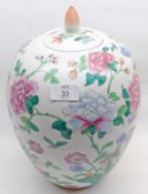 An Oriental Large Covered Jar, of baluster form, painted in shades of famille verte, underglaze