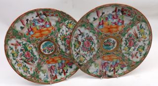 A pair of Canton Famille Rose Circular Plates, each typically decorated in typical colours with