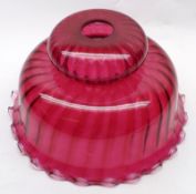 A large Dark Cranberry Glass Ceiling Light Shade of frilled form, 12” wide