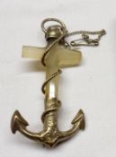An early 20th Century Moonstone and white metal mounted Cross/Anchor Pendant with later brooch