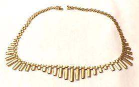 A Modernist type hallmarked 9ct Gold Fringe Necklet, of variable length articulated drops, 41cm